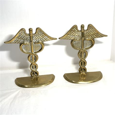 bookends hermes caduceus copper art deco|Vintage Set of Art Deco Medical CADUCEUS Bookends / 1940's .